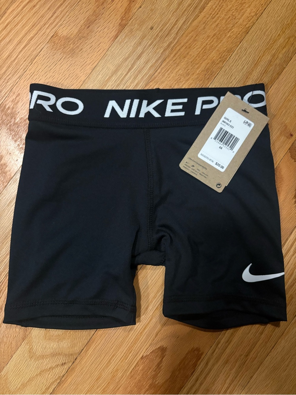 Nike Black Girls' Performance Leggings Shorts with White Swoosh